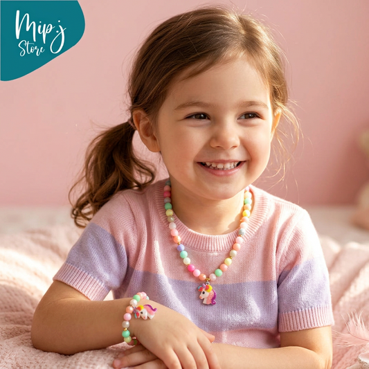 Colorful beaded necklace with unicorn charms on a pink background